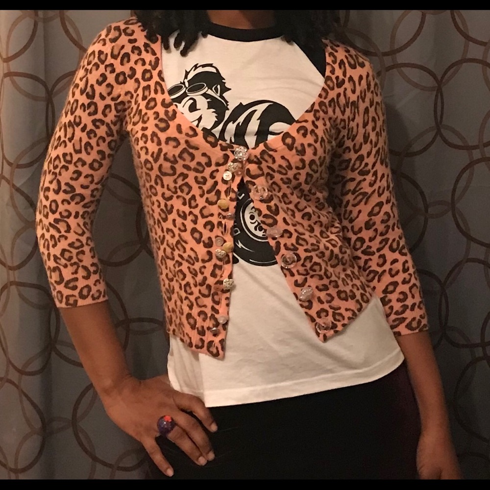 dELiA*s animal print cardigan w/eclectic buttons.